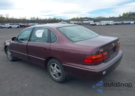 1999 Toyota Avalon Xls z USA, uszkodzony, nr VIN 4T1BF18BXXU299725